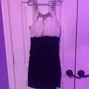 Body con dress with jeweled accent around the neck